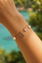 Trinity Glow Charm Bracelet